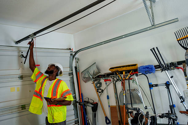 Professional Garage Door Panel Replacement technician working in East Moline, IL